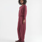 The Daily Sweatshirt in Cherry Cola. On body front side - Jamie Haller