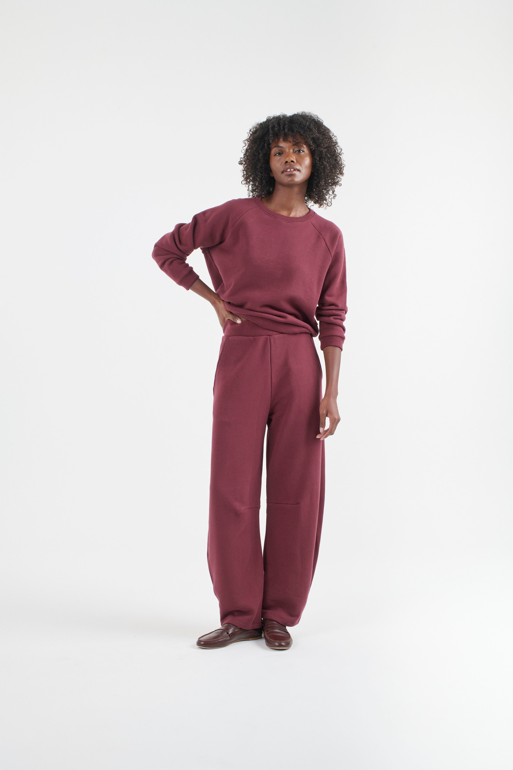 The Daily Sweatshirt in Cherry Cola. On body front - Jamie Haller