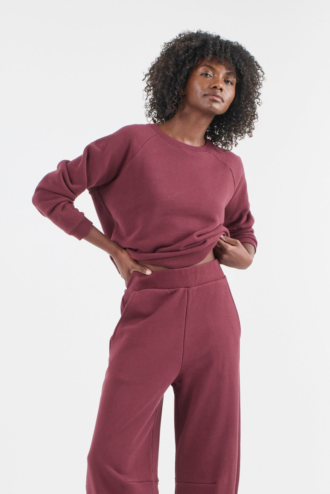The Daily Sweatshirt in Cherry Cola. On body front - Jamie Haller