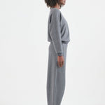 The Arc lounge Pant in deep grey. On body side - Jamie Haller