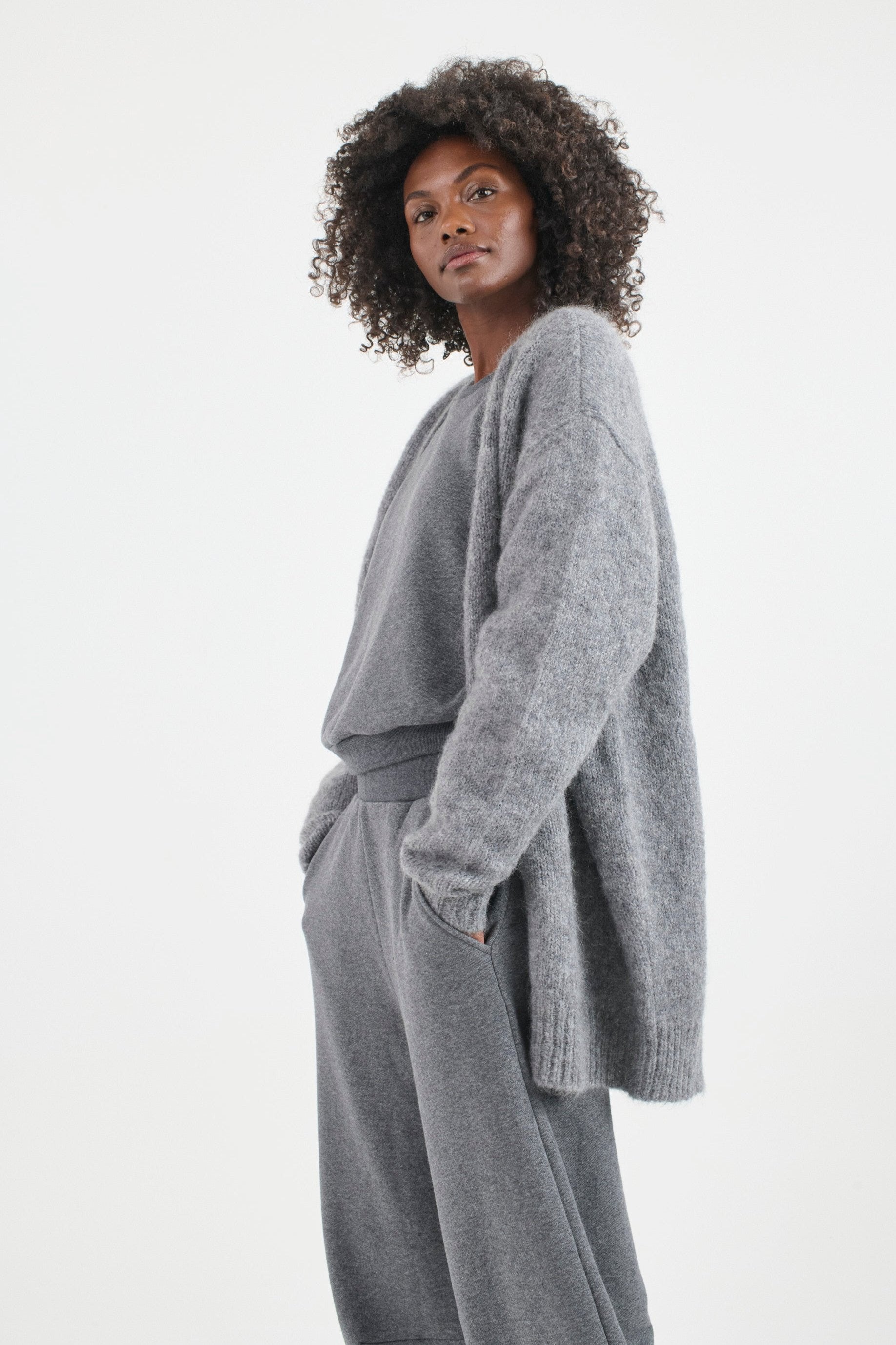 The Arc Lounge Pant in deep grey. On body side - Jamie Haller