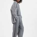 The Arc Lounge Pant in deep grey. On body side - Jamie Haller