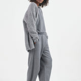 The Arc Lounge Pant in deep grey. On body side - Jamie Haller