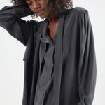 The Brooks Blouse in Dark Grey. On body front side - Jamie Haller