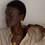 The Chaos Sunburst Necklace in Gold