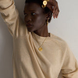 The Chaos Sunburst Charm Bracelet in Gold