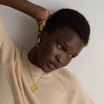 The Chaos Sunburst Necklace in Gold