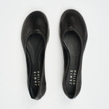 The Minimalist Slipper in Black Flat Front