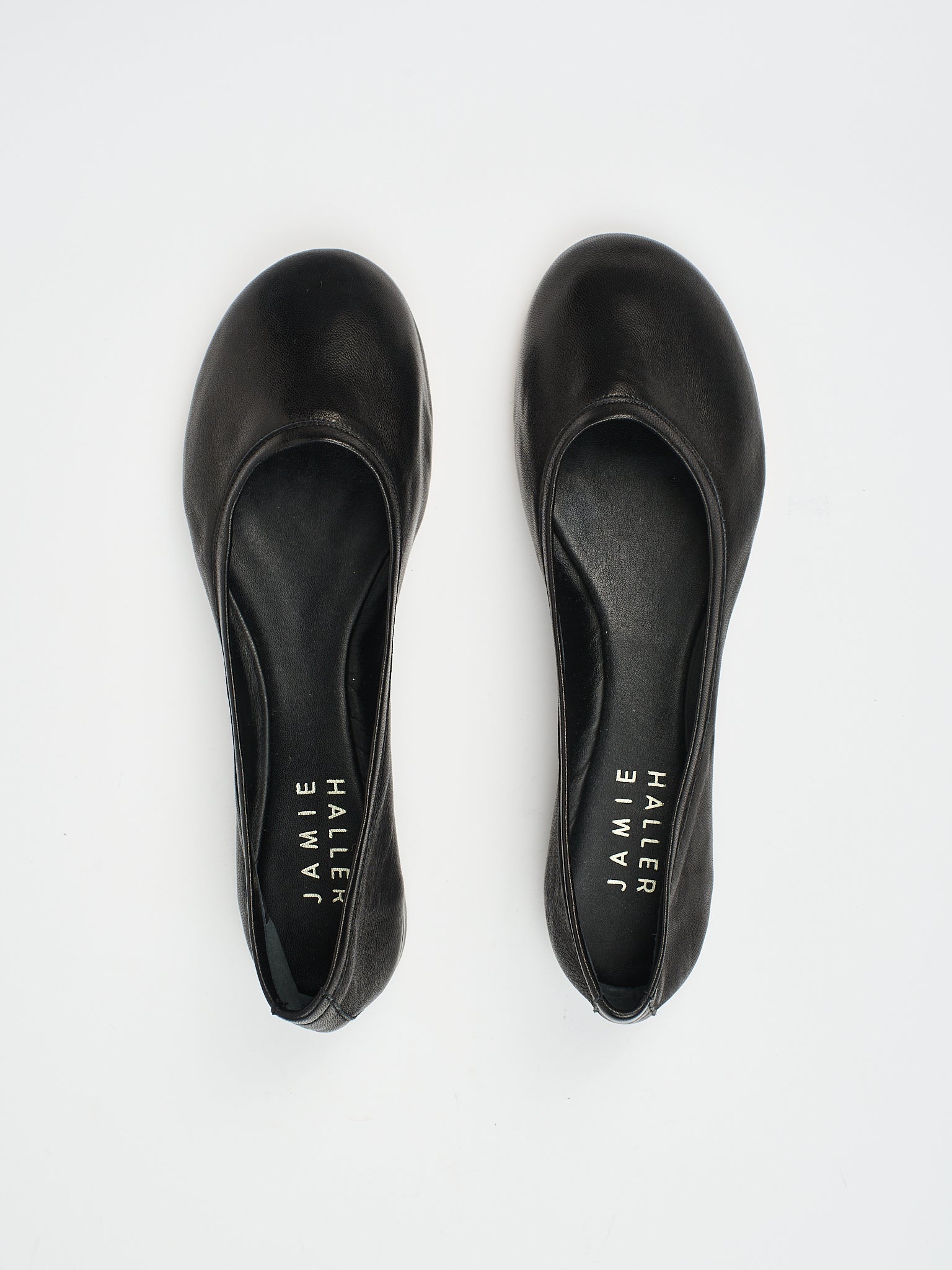 The Minimalist Slipper in Black Flat Front