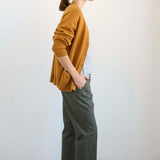 The Welt Pocket Cashmere Cardigan in Gold