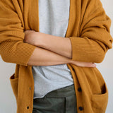 The Welt Pocket Cashmere Cardigan in Gold