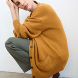 The Welt Pocket Cashmere Cardigan in Gold