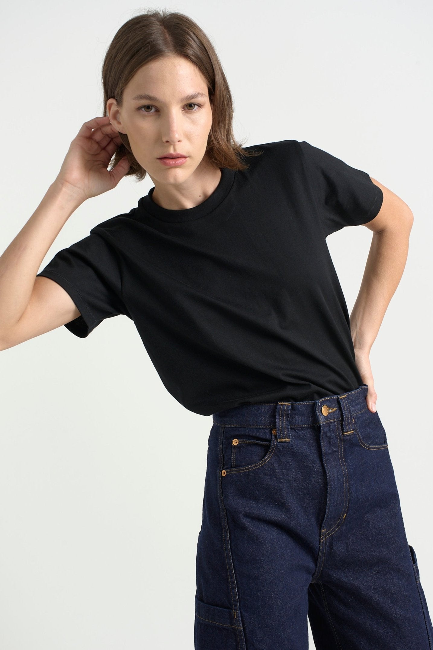 The Chameleon Tee in Black. On body front - Jamie Haller