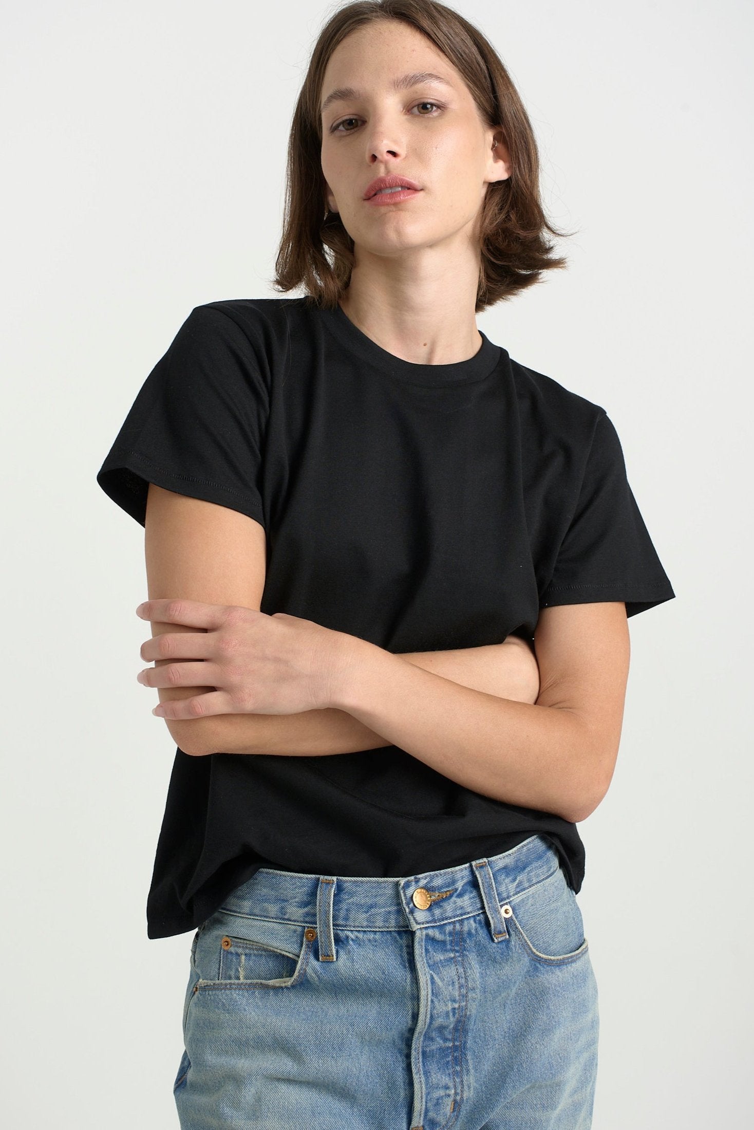 The Chameleon Tee in Black. On body front - Jamie Haller