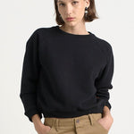 The Daily Sweatshirt in Black. On body front - Jamie Haller