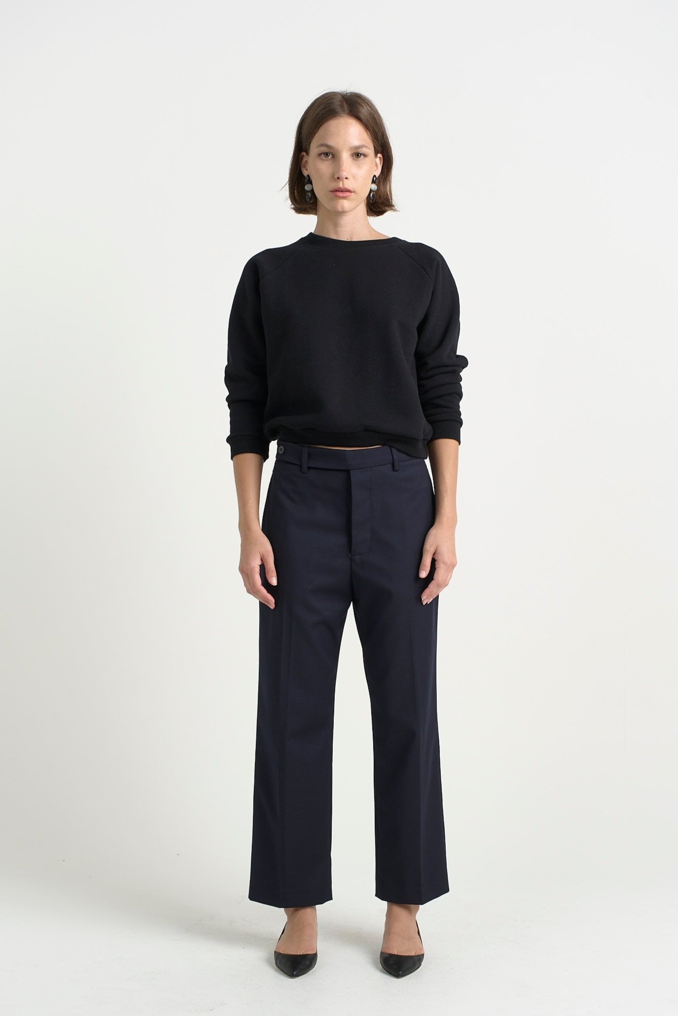 The Daily Sweatshirt in Black. On body front - Jamie Haller