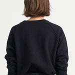 The Daily Sweatshirt in Black. On body back - Jamie Haller