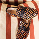 Black and Brown Woven Loafer Flat View Stripe Background
