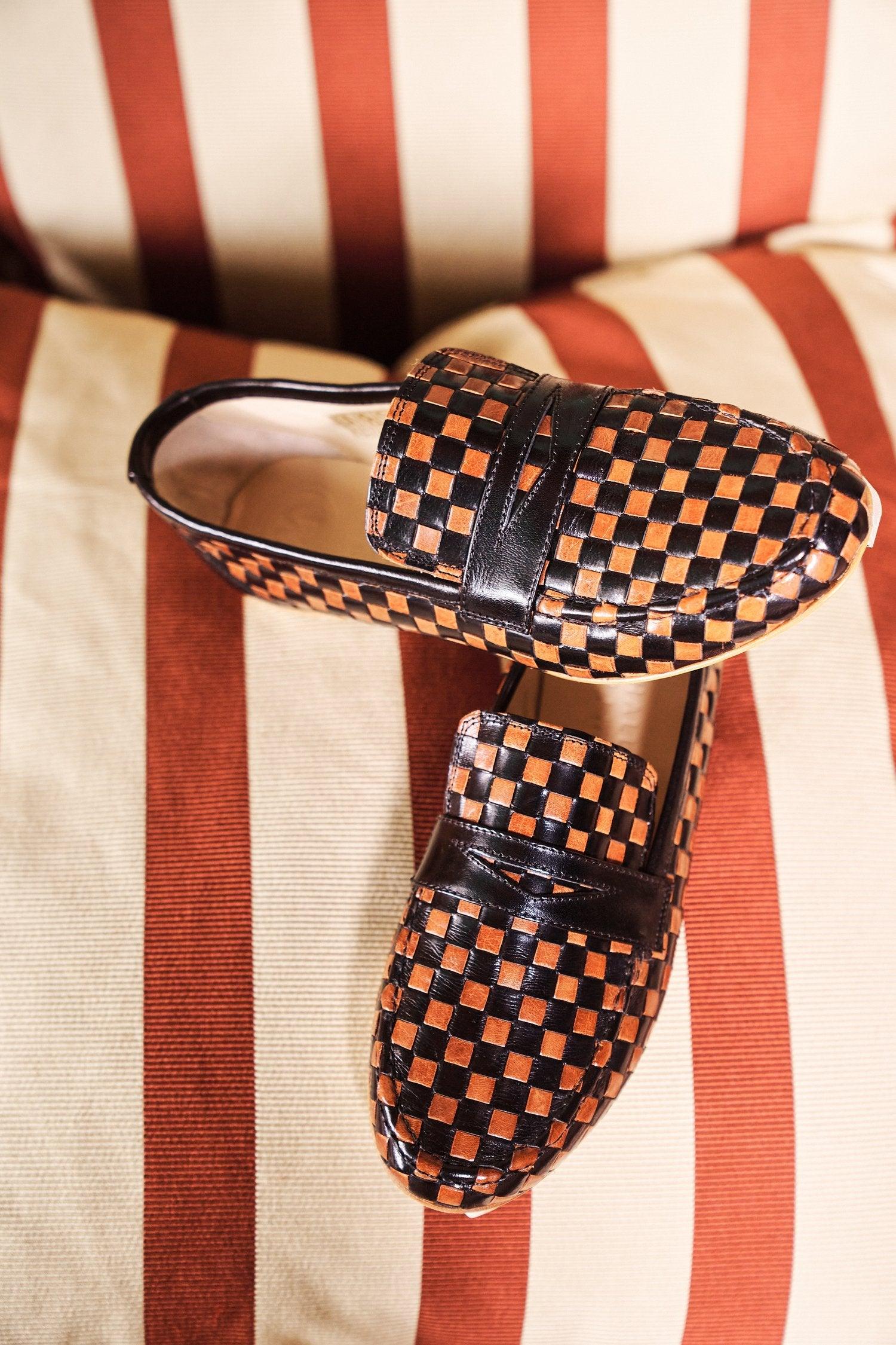 Black and Brown Woven Loafer Flat View Stripe Background