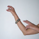 The Chaos Sunburst Charm Bracelet in Sterling Silver